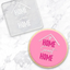 Clear acrylic debosser tool with Home Sweet Home. Alongside a pink cookie showcasing its end result