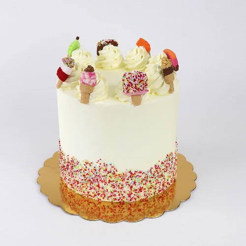 a cake decorated with ice cream cones and popsicles made of fondant icing