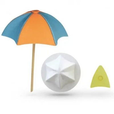Jem beach umbrella icing cutter and former set. Alongside icing example of abeach umbrella