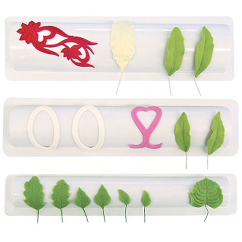 Plastic formers, with icing leaves and petals laid across to dry