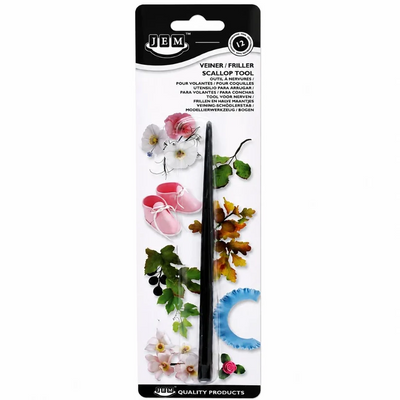 JEM Scallop Tool in its original retail packaging, featuring a black metal scallop tool with decorative illustrations of flowers, shoes, and leaves on a white backing card.