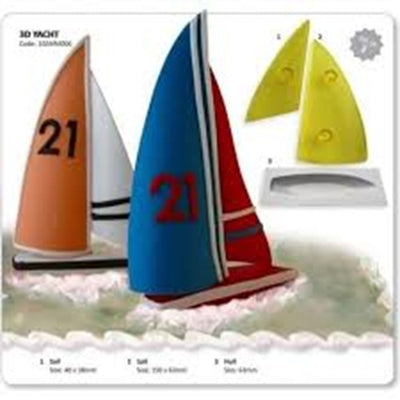 plastic sail cutters and former alongside an icing example of finished 3 d sailboats