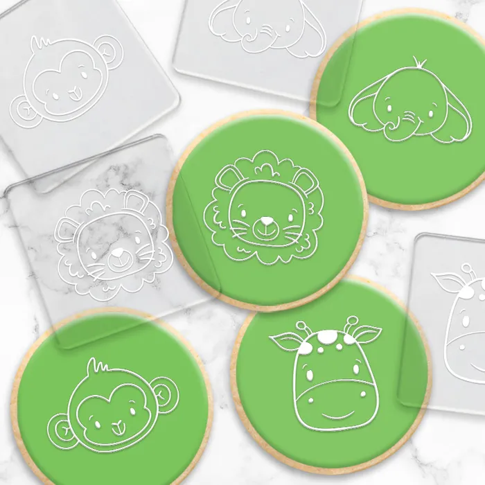 set 4 acrylic debosser featuring jungle animals. Alongside fondant cookie examples made using them