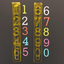 Two transparent yellow plastic number strips shown vertically on a dark background, alongside individual colorful numerals from 0 to 9 in white, yellow, red, blue, and pink.