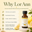 A bottle of LorAnn Natural Lemon Oil displayed on a light cream background with promotional text on the left and fresh lemon slices and leaves on the right. The bottle is amber glass with a black cap and a white label featuring yellow and green accents.