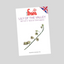  'Lily of the Valley' by Fmm, shown at a slight angle on a solid gray background. The white packet features the red and purple Fmm logo, a small Union Jack flag, and an illustration of a lily of the valley stem with pale green flowers.