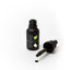 Black bottle of Sprinks gel color with dropper on a white background