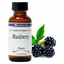 Lorann 1oz bottle of flavouring sitting alongside fresh blackberries
