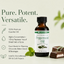 A bottle of Lorann Natural Peppermint Oil centered on a light cream background with marketing text on the left and chocolate pieces with mint leaves on the right.