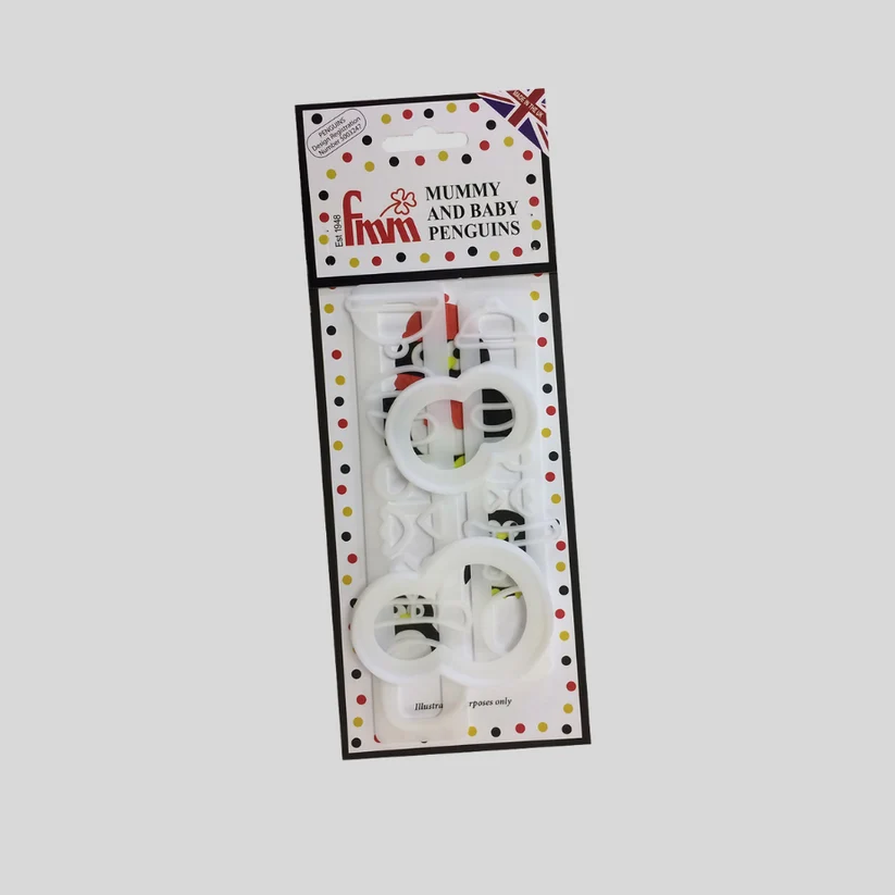 A packaged set of novelty baby tcutters shaped for penguins, mounted on a printed retail card with the text 'MUMMY AND BABY PENGUINS' and the brand name 'fmm' visible.