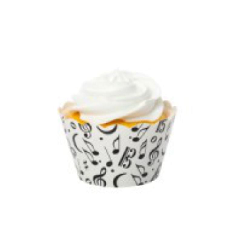 Cupcake with white frosting in a decorative cup on a white background