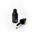 Black bottle of Sprinks gel color with dropper on a white background
