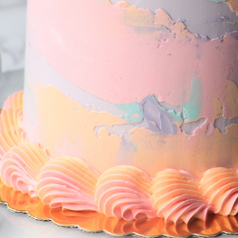 example of a cake with peach coloured icing