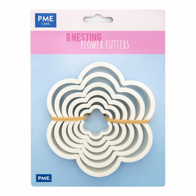 PME Cake 6 Nesting Flower Cutters in white, packaged in a blue and pink card with a rubber band holding the nested cutters together.