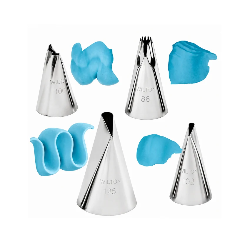 4 metal piping tips with icing examples