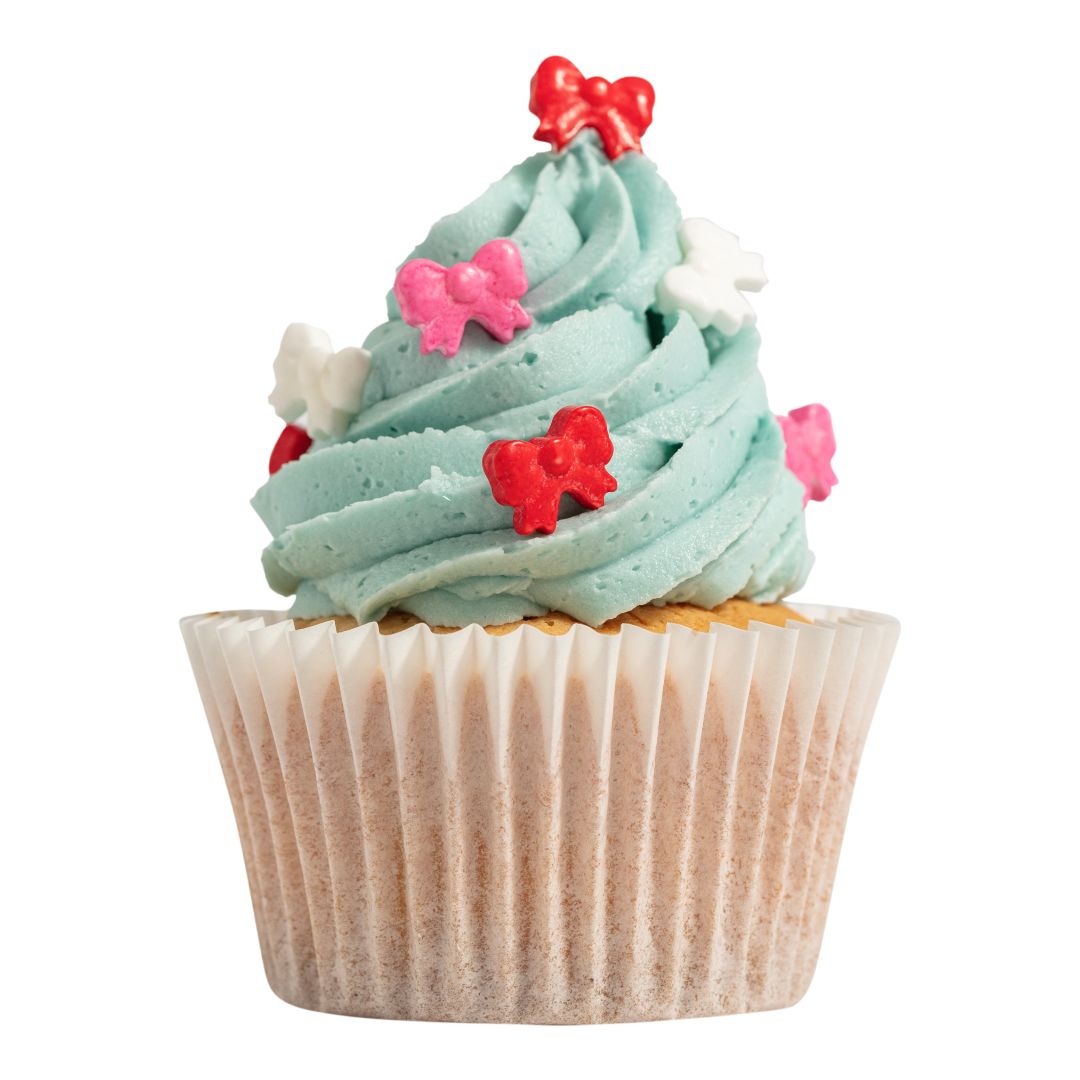 Cupcake with light blue frosting, red and pink bow decorations on a white background