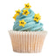 Cupcake with blue frosting and yellow star-shaped decorations on a white background