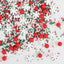 Colorful Christmas-themed sprinkles with red, green, and white on a white background