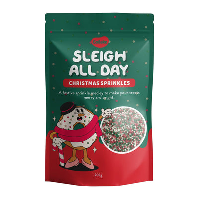 Packaging of 'Sleigh All Day' Christmas sprinkles with a cartoon reindeer character on a white background.