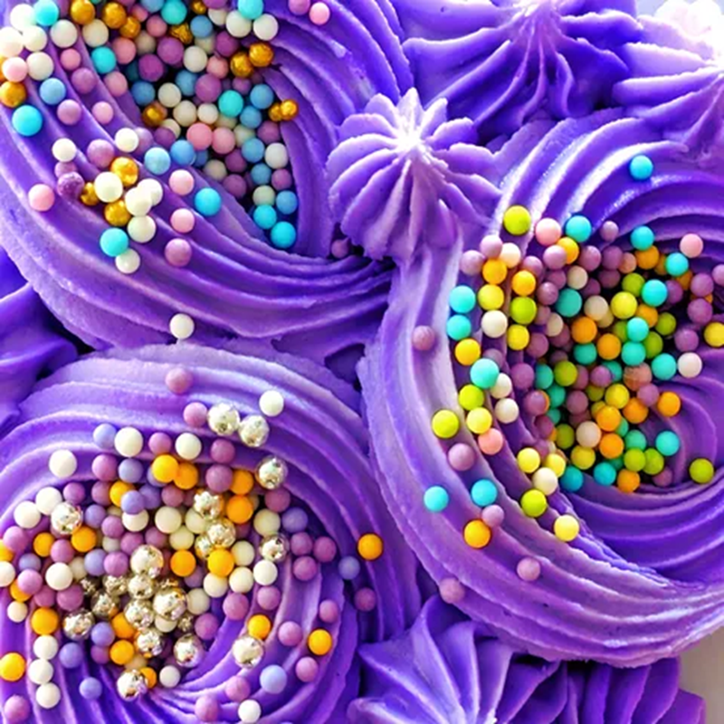 Purple Frosting Swirls with Sprink'd Princess Posy mix sprinkles