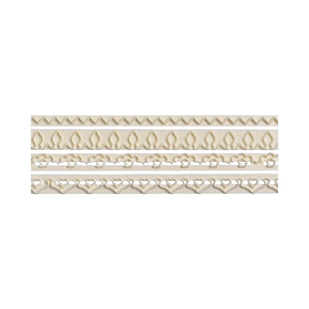 Four horizontal decorative trim or lace-like plastic fondant border cutters on a plain white background, each with a repeating ornamental pattern in warm cream or beige tones.