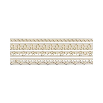 Four horizontal decorative trim or lace-like plastic fondant border cutters on a plain white background, each with a repeating ornamental pattern in warm cream or beige tones.