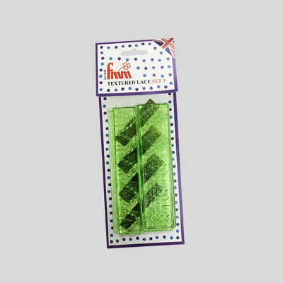 A packaged green textured lace set in a clear plastic sleeve with a white header card featuring blue polka dots and the brand name 'fmm' in red script, shown on a plain light gray background.