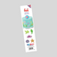 A tall white packaging card for Fmm 'Under the Sea' cake toppers, featuring a turquoise seashell cake decoration example and six individual sea-themed cutouts including a green seahorse, purple octopus, orange starfish, and lavender clam, shown on a flat gray background.