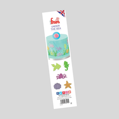 A tall white packaging card for Fmm 'Under the Sea' cake toppers, featuring a turquoise seashell cake decoration example and six individual sea-themed cutouts including a green seahorse, purple octopus, orange starfish, and lavender clam, shown on a flat gray background.