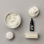 White icing examples and a bottle of sprinks white food colouring