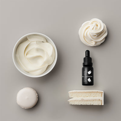 White icing examples and a bottle of sprinks white food colouring