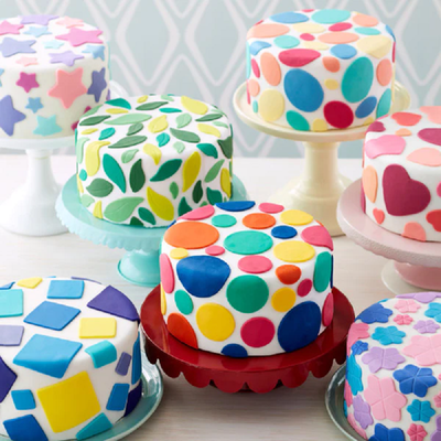 Cakes decorated with fondant shapes made with Wilton nesting shaped Cut-out Sets