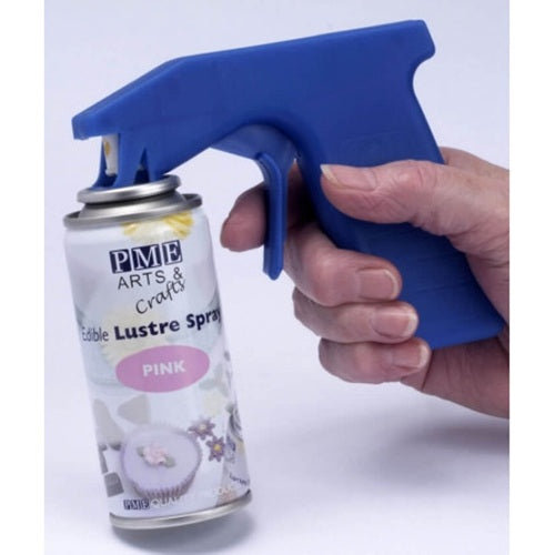 A blue spray gun designed for use with edible lustre spray cans. Shown connected to a can