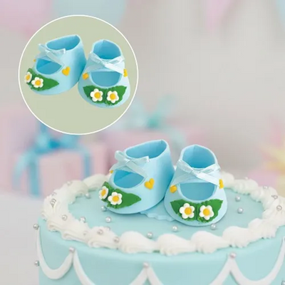 Baby booties sugar icing cake decoration Blue
