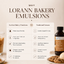 A promotional infographic for Lorann Bakery Emulsions, featuring a bottle of brown butter emulsion on the right and a comparison chart on the left detailing its water-based formula and benefits over traditional alcohol-based extracts. The background is a warm beige tone.