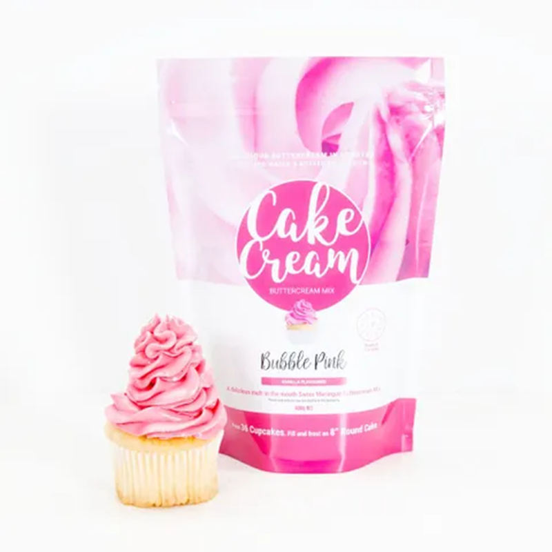 Bag of Cake Cream Bubble Pink buttercream mix with a cupcake frosted with pink cream on a white background