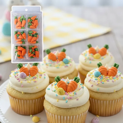 Cupcakes decorated with icing carrot decorations