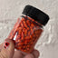 Jar of 14mm carrot shaped sprinkles