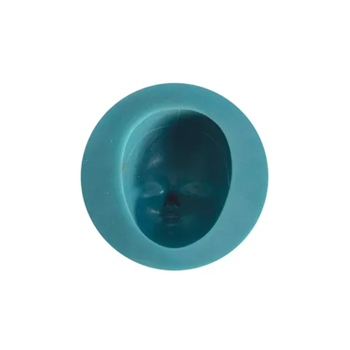 A teal blue circular silicone mold with a recessed oval face design, shown on a plain white background.