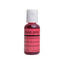 A small bottle of airbrush food coloring with a white cap and a pink label reading 'deep pink' on a white background.