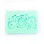A mint green rectangular silicone mold with embossed floral designs, including a central rose and two daisies, on a plain white background.