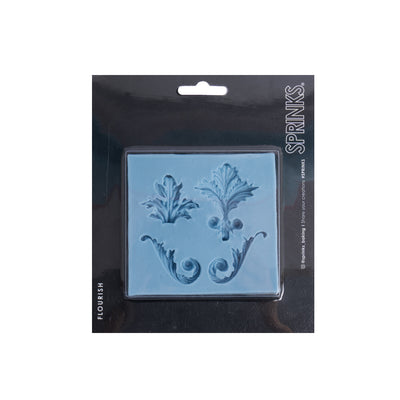 Decorative silicone mold "Flourish" with baroque patterns in packaging, brand 'Sprinks' visible.