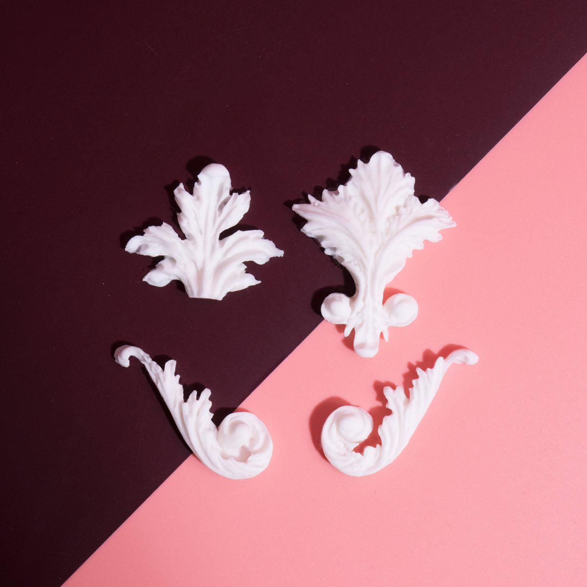 Examples of finished baroque gumpaste shapes for cakes
