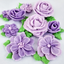 Examples of piped flowers created using the flower and leaf piping tip set