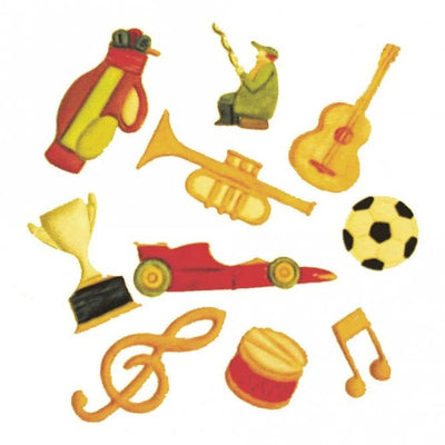 A collection of colorful, cartoon-style musical and sports-themed fondant or gumpaste icing decorations on a plain white background, including a golf bag, trumpet, guitar, soccer ball, trophy, race car, drum, treble clef, and musical notes.