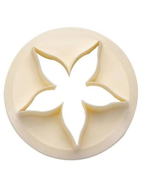 An off-white circular plastic cutter with a five-petal calyx silhouette cutout, shown on a solid white background.