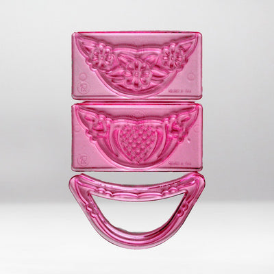 2 plastic embosser in a lace design with a matching cutter to create drapes and swags