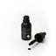 Black bottle of Sprinks gel color with dropper on a white background
