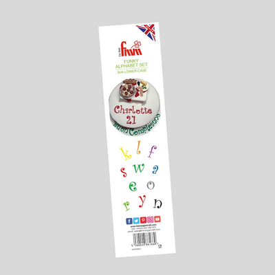 A vertical package insert for a 'Funky Alphabet Set' by the brand 'Fmm', showing colorful raised alphabet letters and a sample cake decoration on a white card against a light gray background.