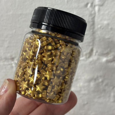 Gold metallic stars sprinkles 100ml jar by Kiwicakes